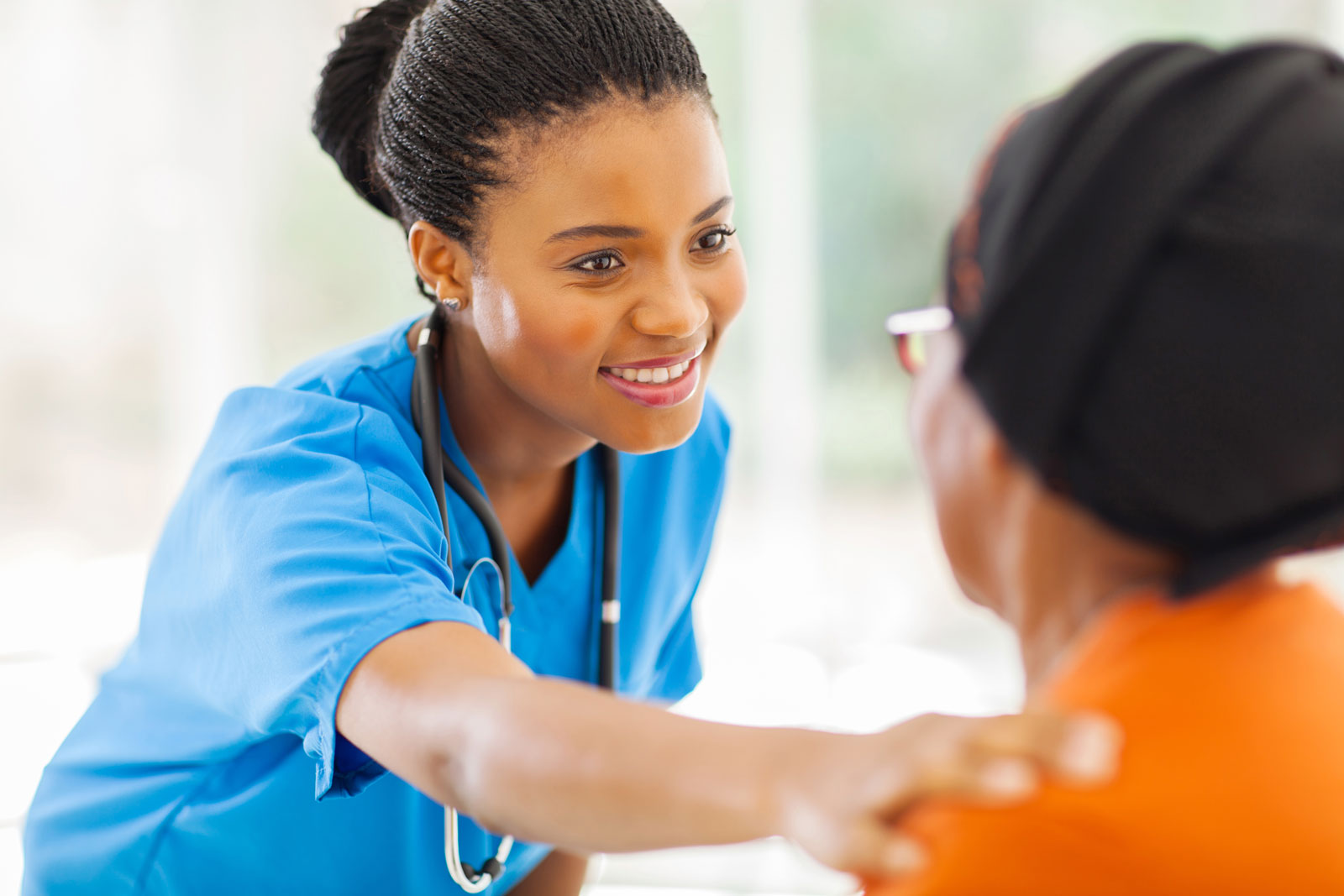 doctor comforting patient.