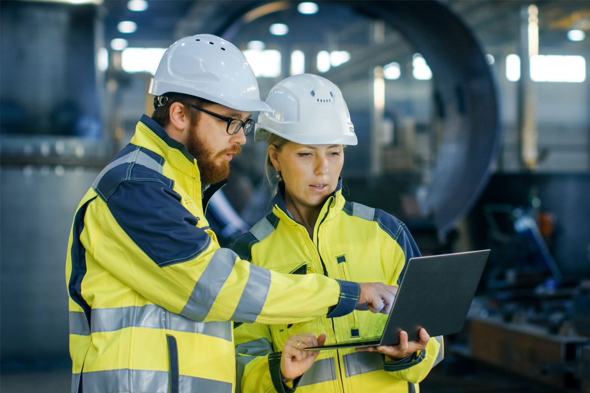 engineers looking at computer