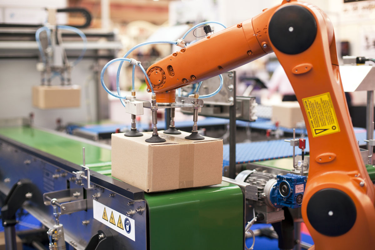 robotic arm picking up a package